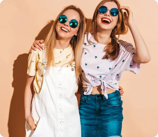 Two friends in stylish outfits